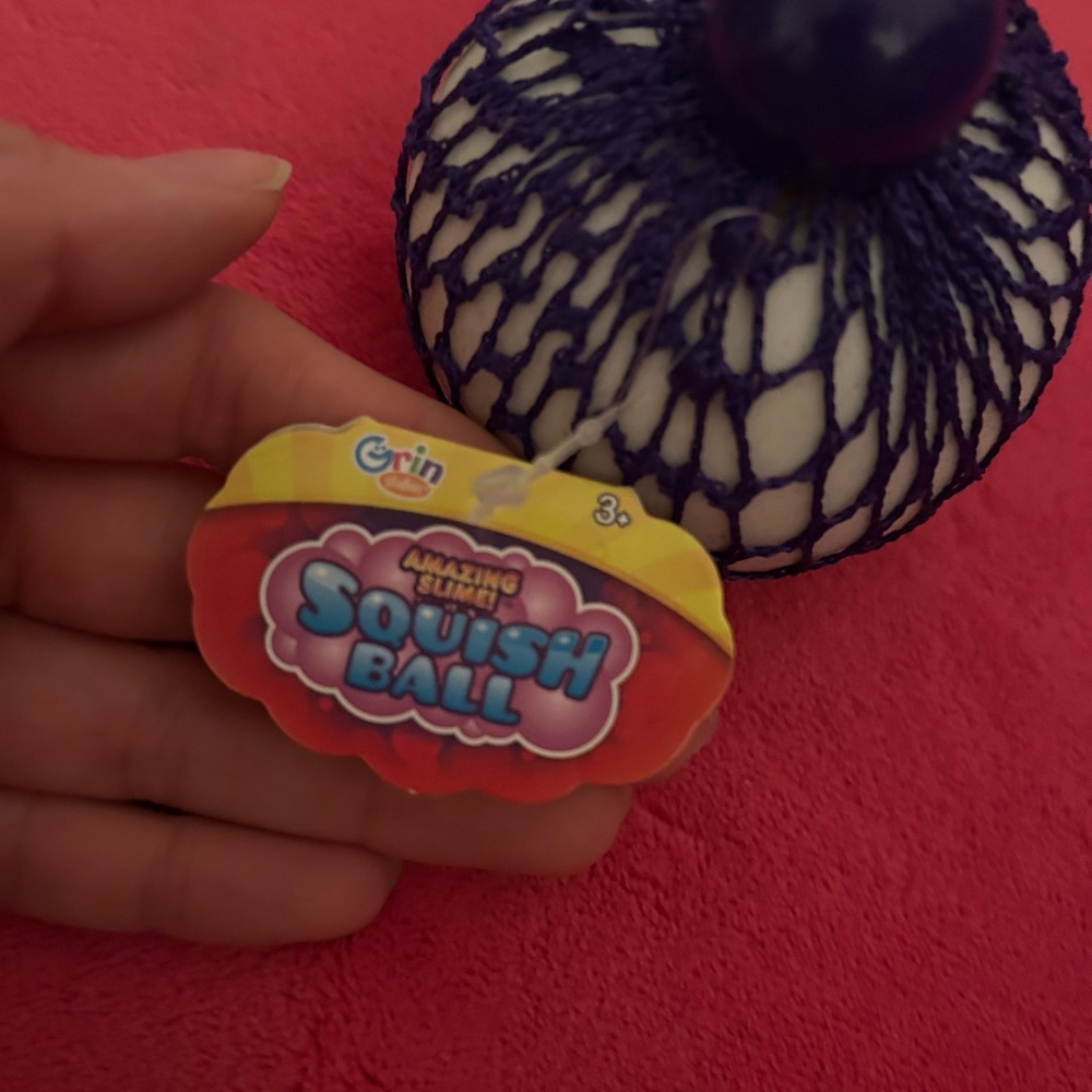 Purple and White Squish Ball